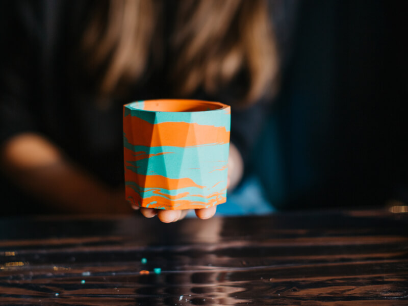 Close-up of a painted colourful ceramic pot